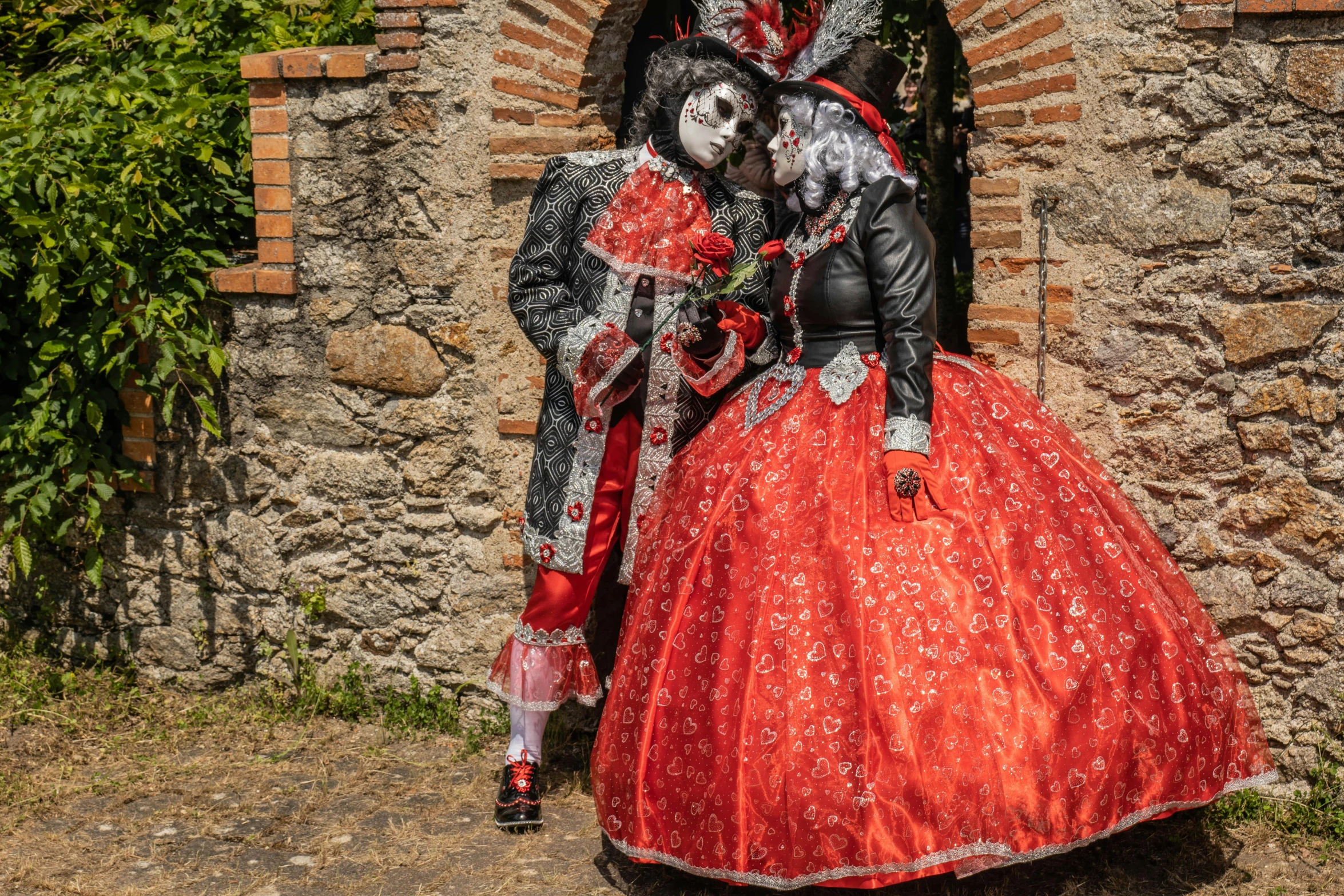 two dolls dressed as mexican day of the dead bride and groom
