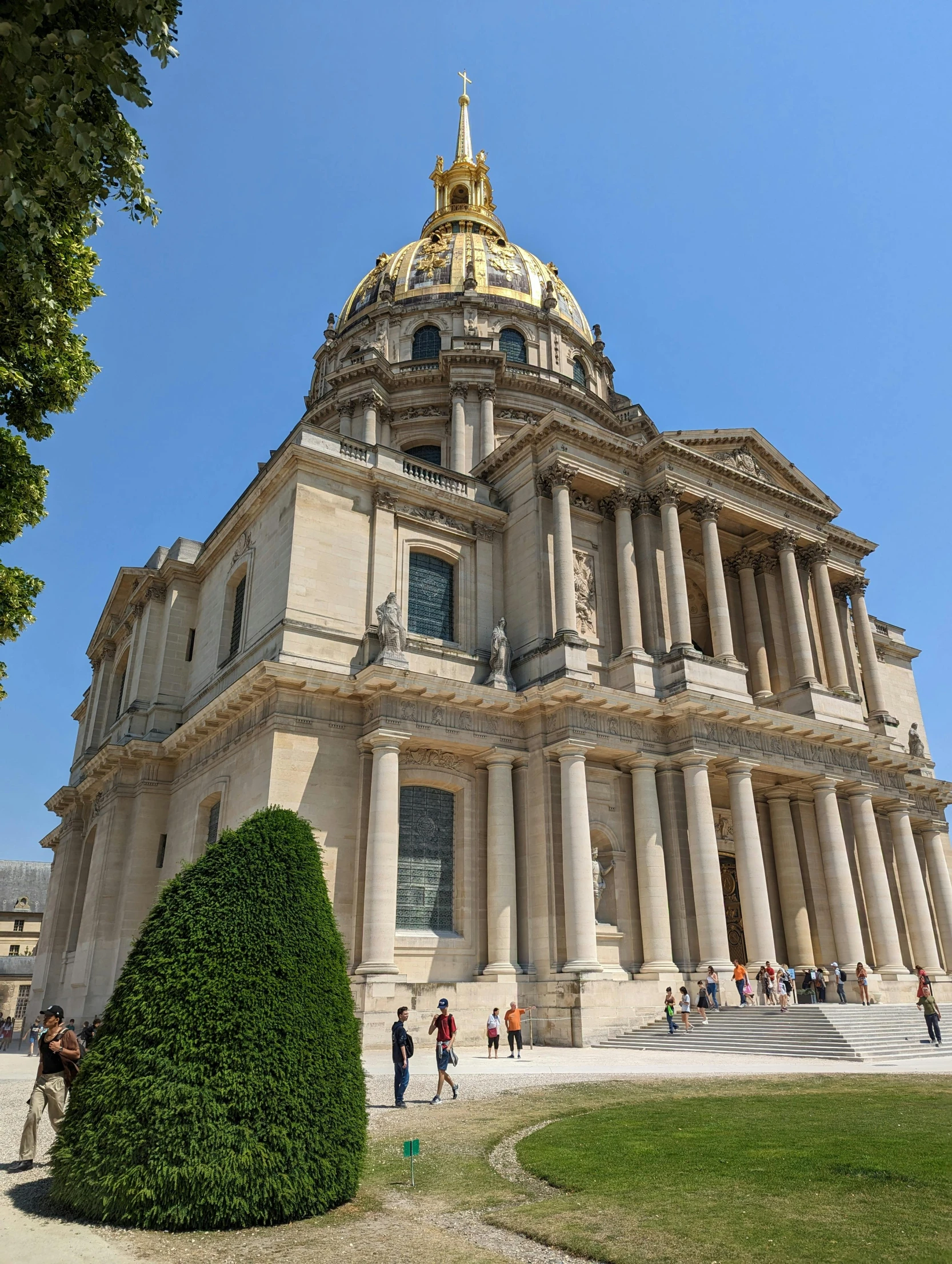 the large building has people around it