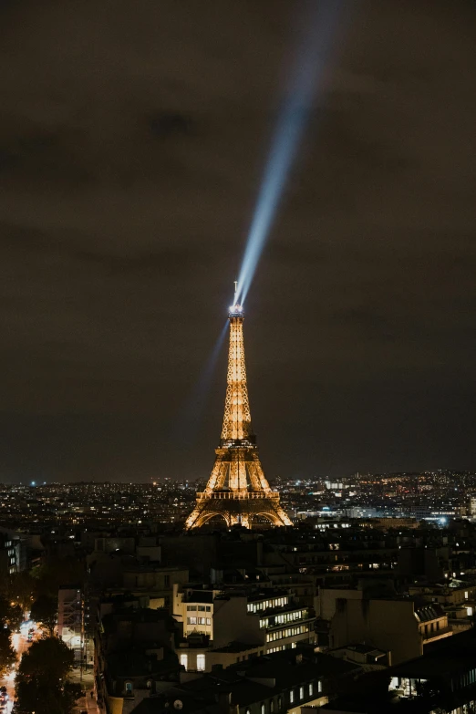 light show on the tower of a city
