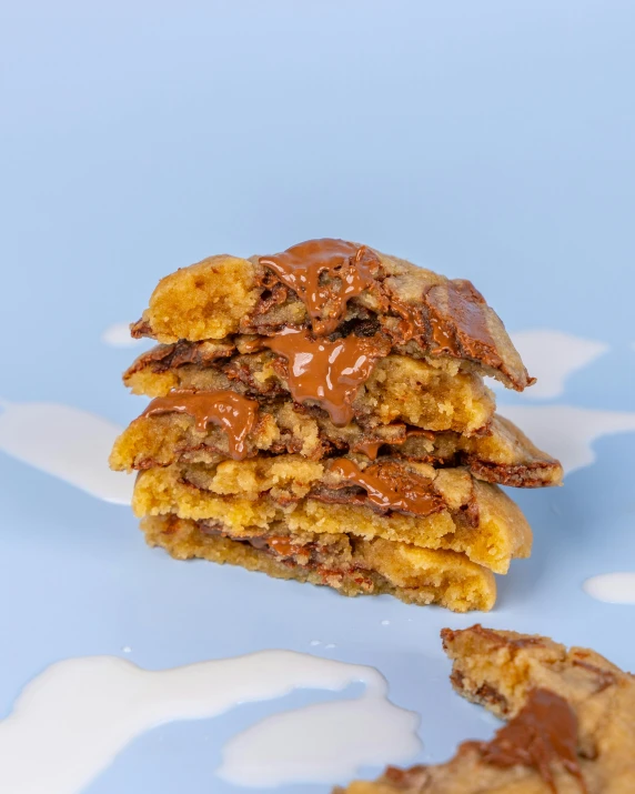 there are cookies stacked on each other on a table