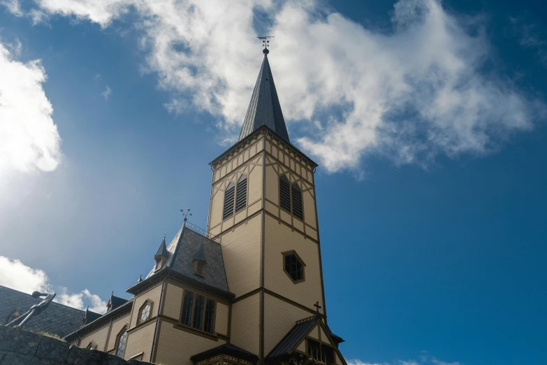 there is a church tower with an ornate steeple on it