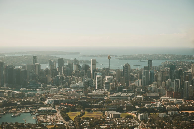 a city is full of tall buildings and other buildings with many windows