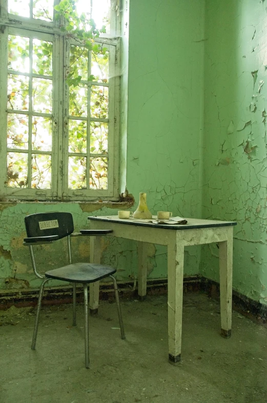 a chair sits by an empty table in a room