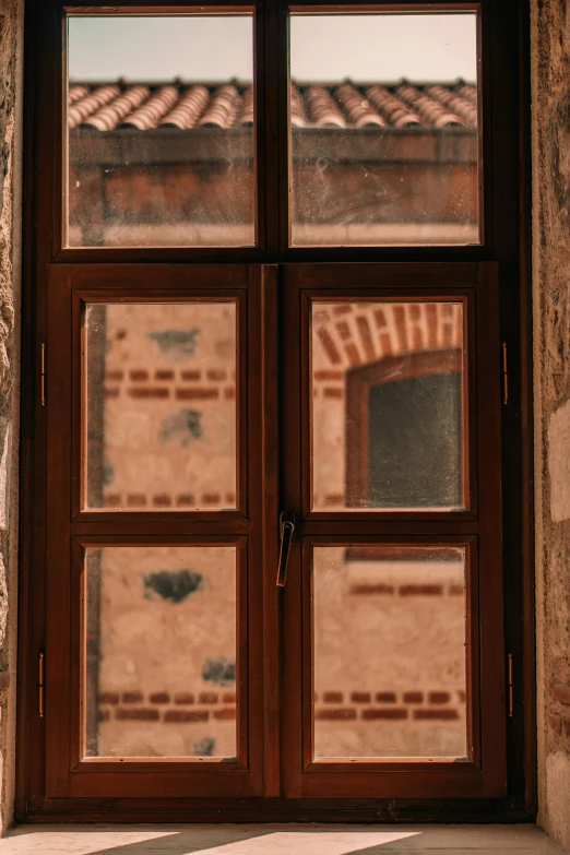 the light shining through the window into the area where the bricks are placed