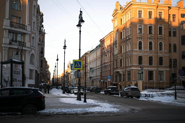 a couple cars are parked along the street