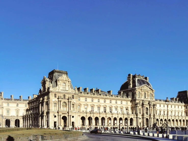 an old european castle stands in the sunlight