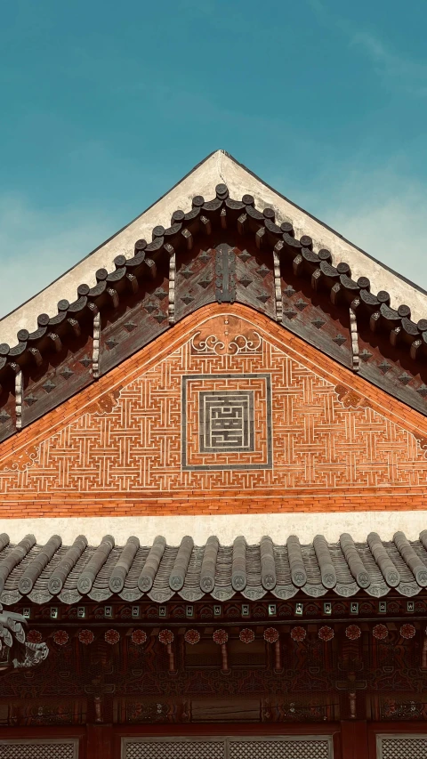 an oriental styled building is painted red