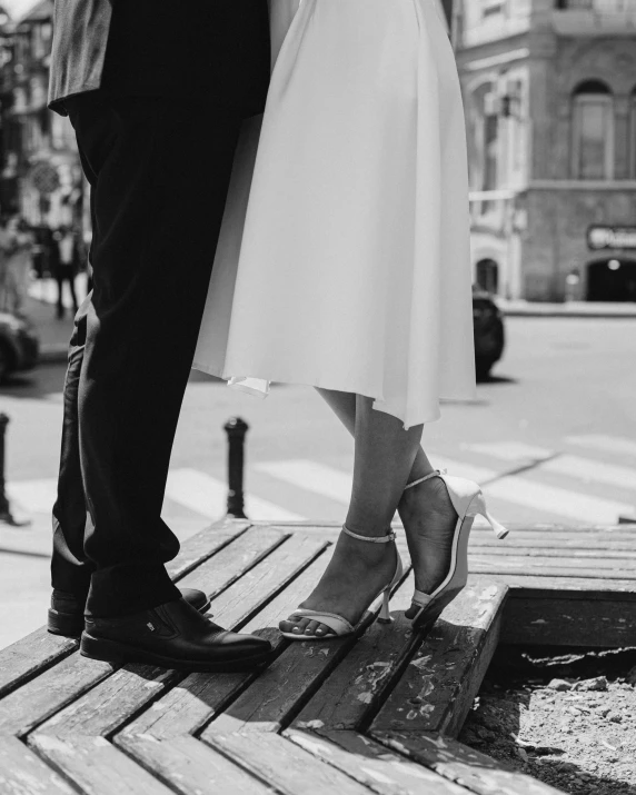 a man and woman that are standing next to each other