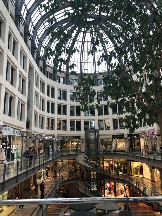 a store with people walking down the inside