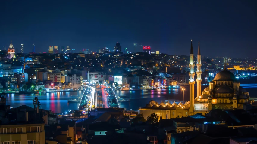 a night view of city lights and buildings from an area called downtown