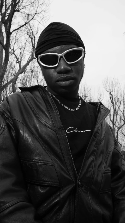 black and white pograph of a woman with sunglasses