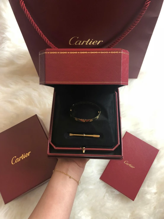 the cartier celet is in its red case