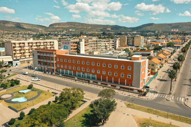 an aerial view of a town square and building