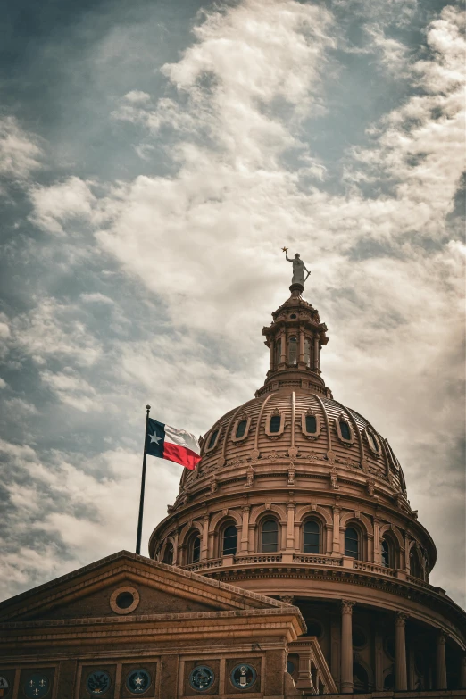 a large building that has a flag on it