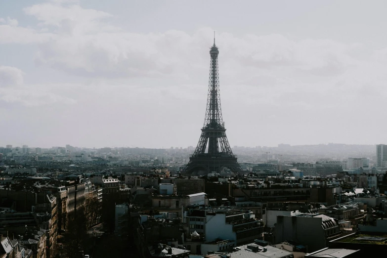 the eiffel tower towering over paris from high up