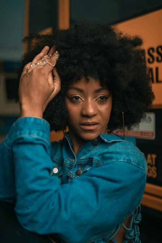 a close up of a person with afro hair