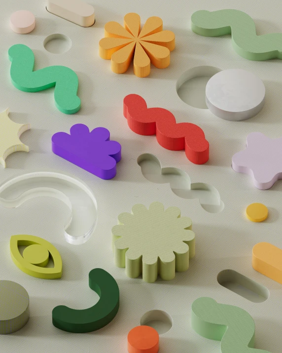 assorted play dough and crafting tools lying on top of a table