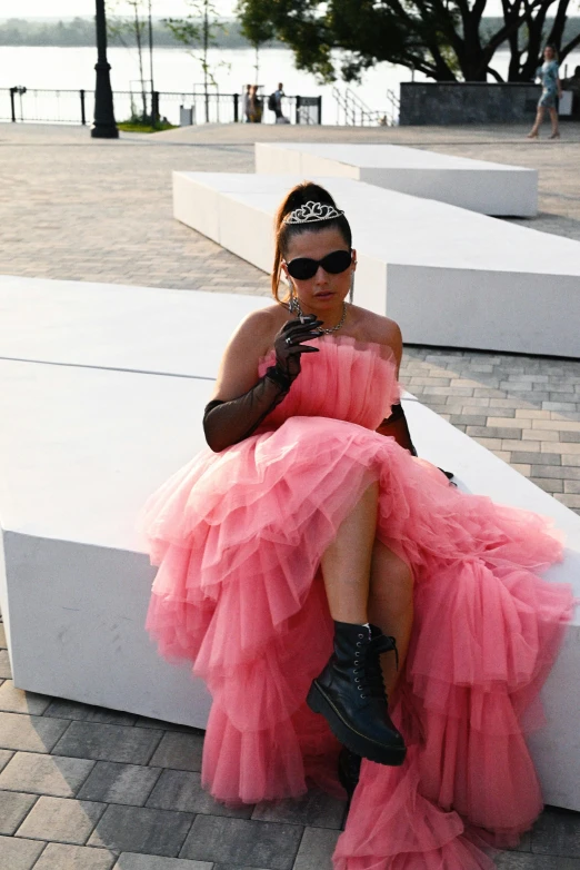 a woman in a dress with high heels and an accessory