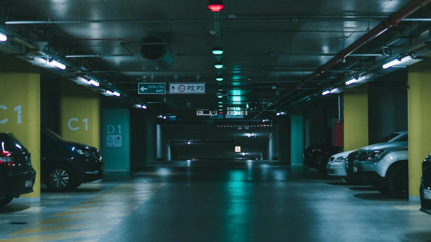 the empty parking garage in the garage is lit by night