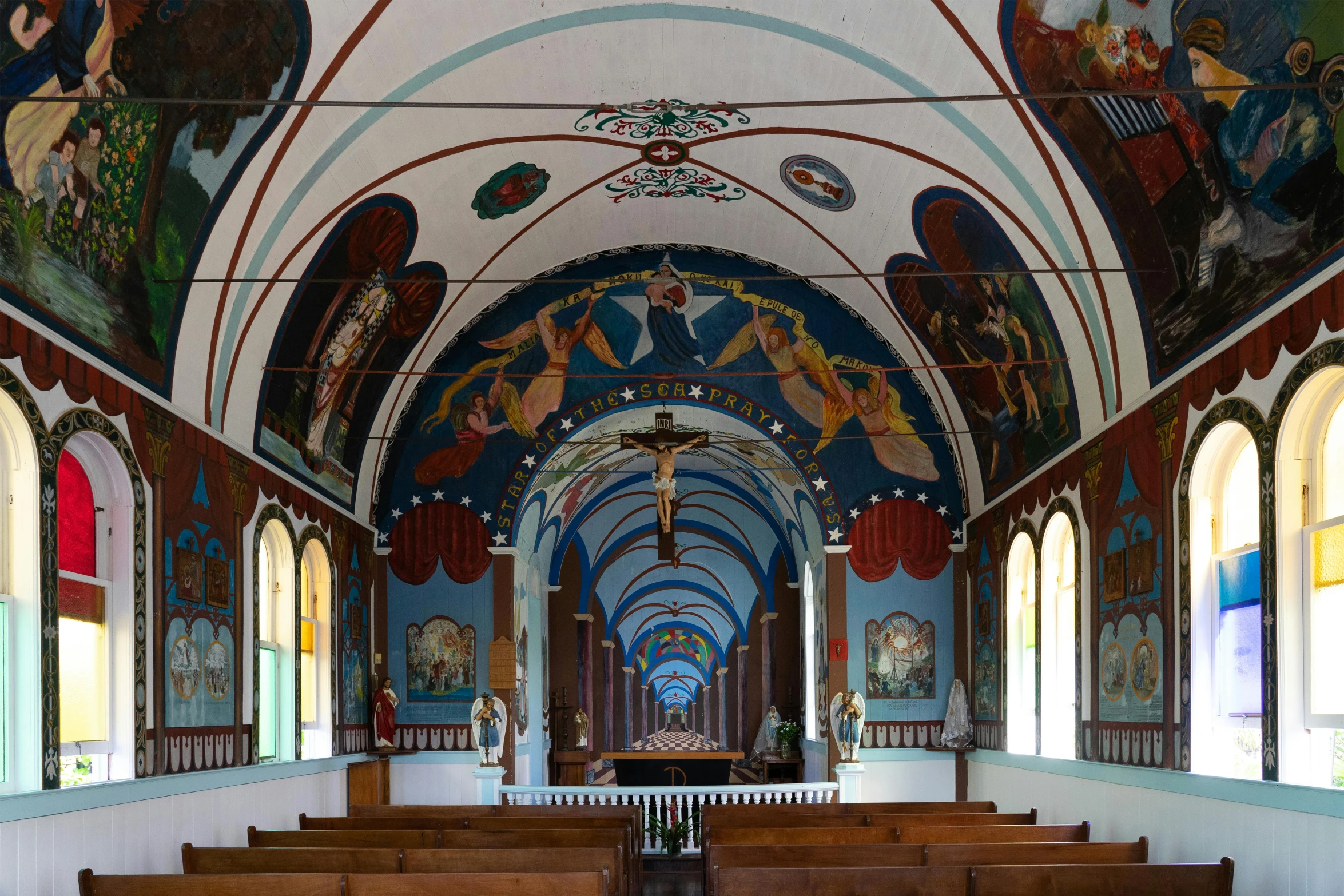 a view inside of a church from the front row