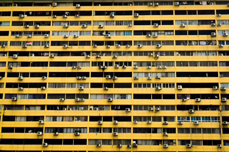 an architectural building with many windows and windows on top of it