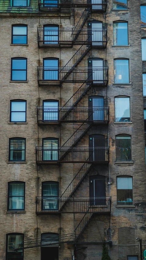 a fire escape that looks like a building with lots of windows