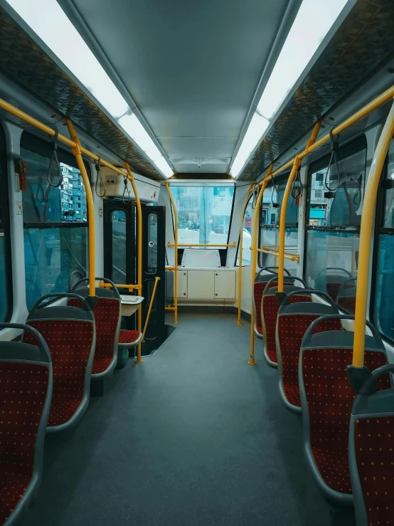 a train with yellow trim and red seats