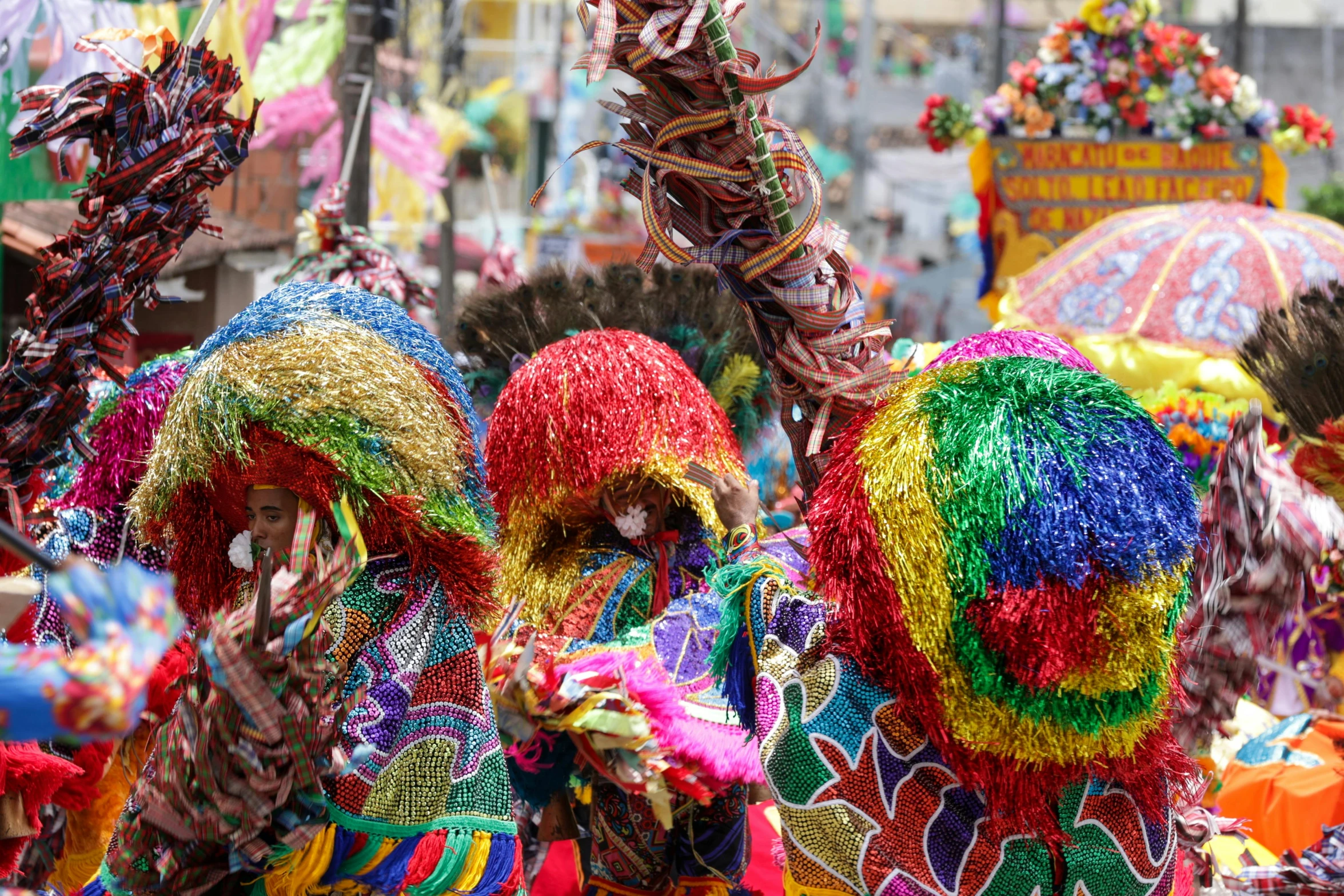 some colorful headdress and other decoration at a carnival