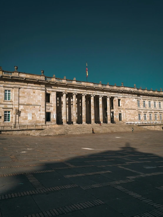 a large building with several doors and windows