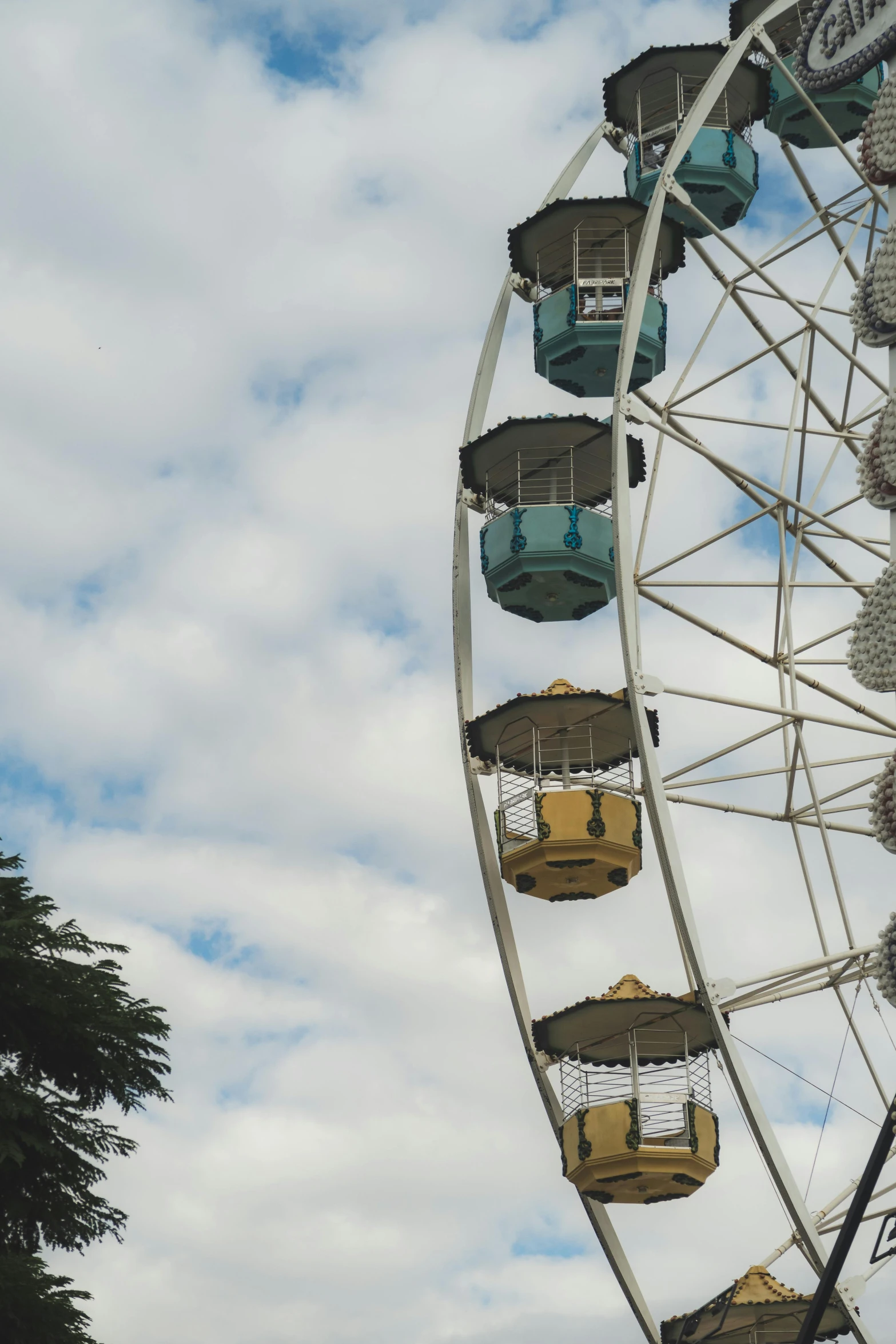 an amut park ferris wheel with a clock