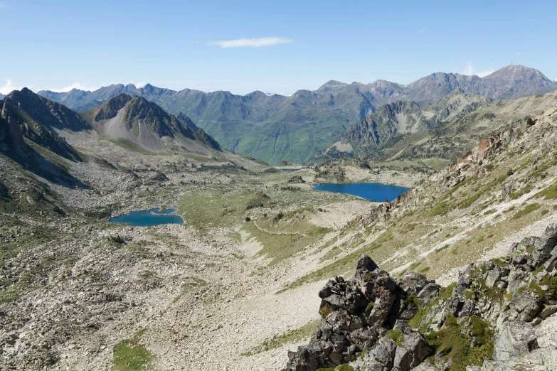 a view of a mountain range from above a lake