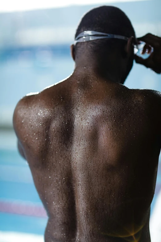 a man's back and chest covered in black hair