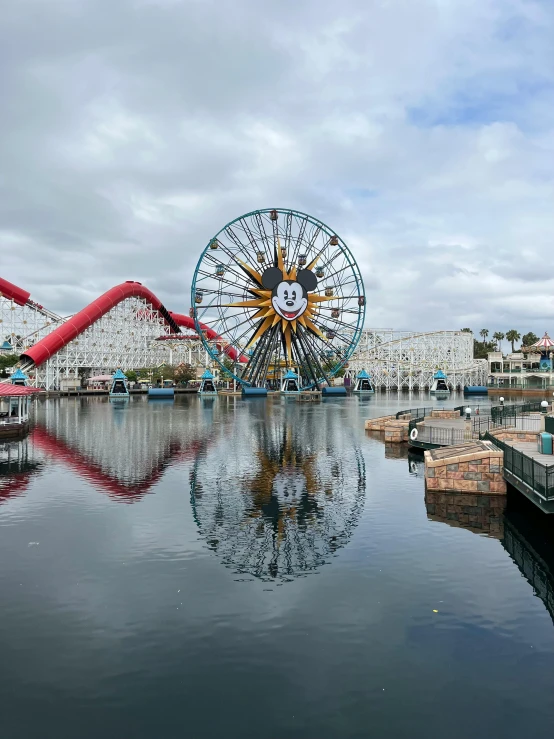 amut park rides on the water in a marina