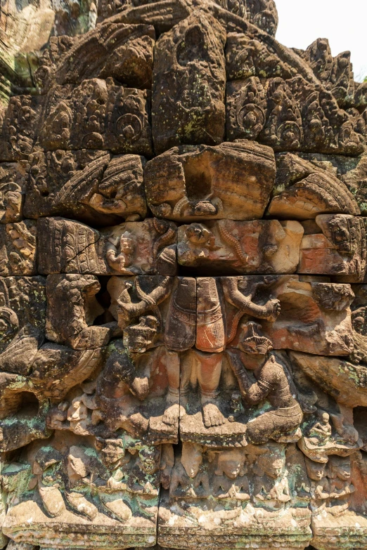 intricate carved art is on the face of a statue