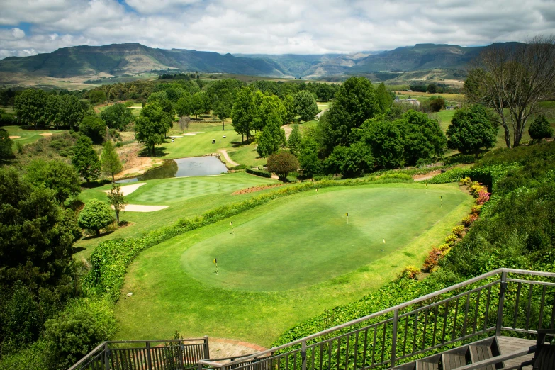 a view of a golf course from a stairway