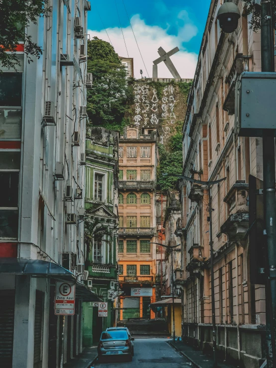 a row of tall buildings line an urban street