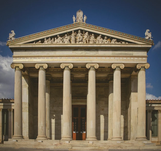 a very large tall building with some columns