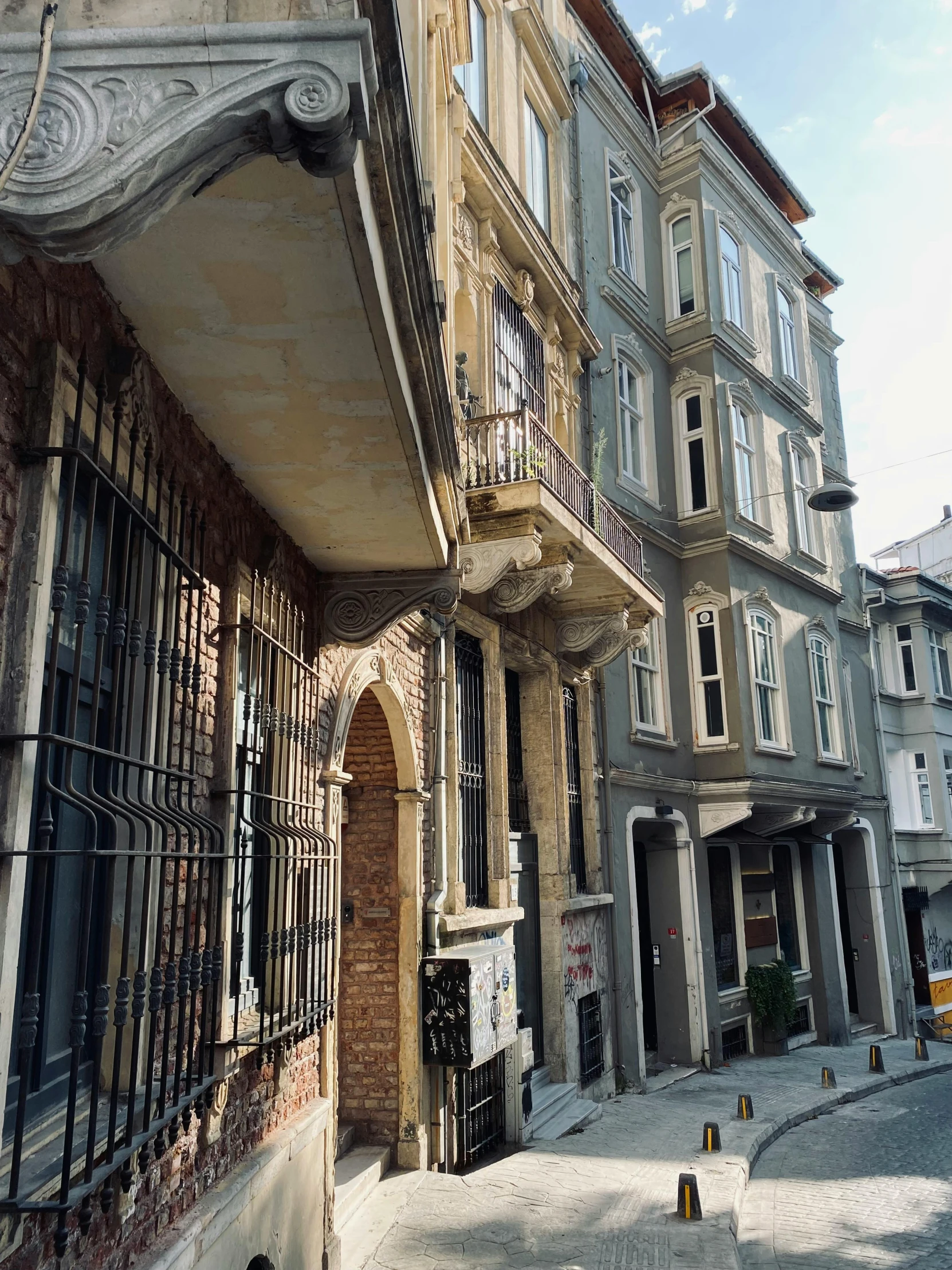 an old fashioned street in the middle of an old city