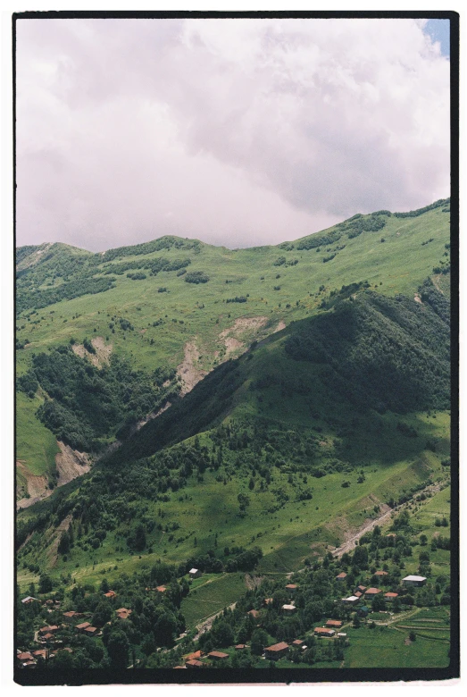 landscape with grassy slopes and green hillside