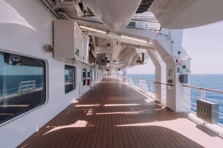 the walkway along side the water leading to a ship