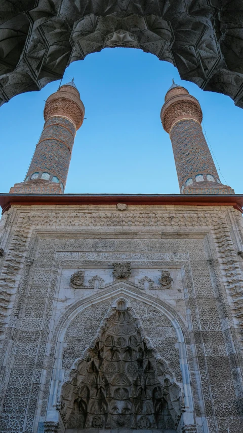 the roof of an islamic building with some very intricate carvings