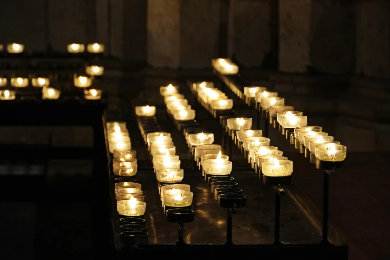 a lot of candles that are on a table