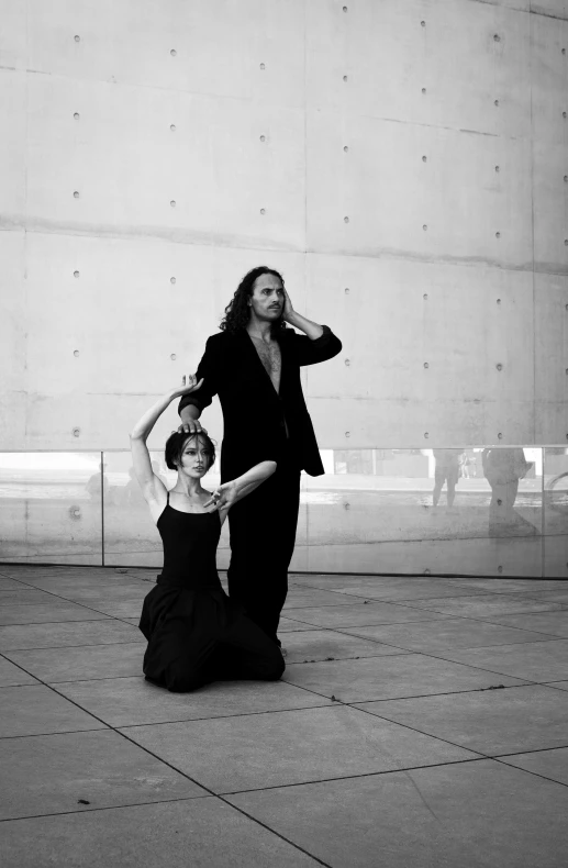 two young women are posing for the camera