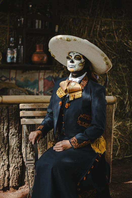 the mexican woman is dressed up in skeleton makeup