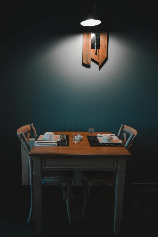 a table that is made out of wooden and has a knife on it