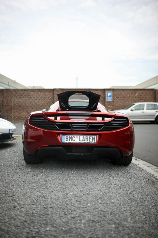 a car parked next to another car in a lot