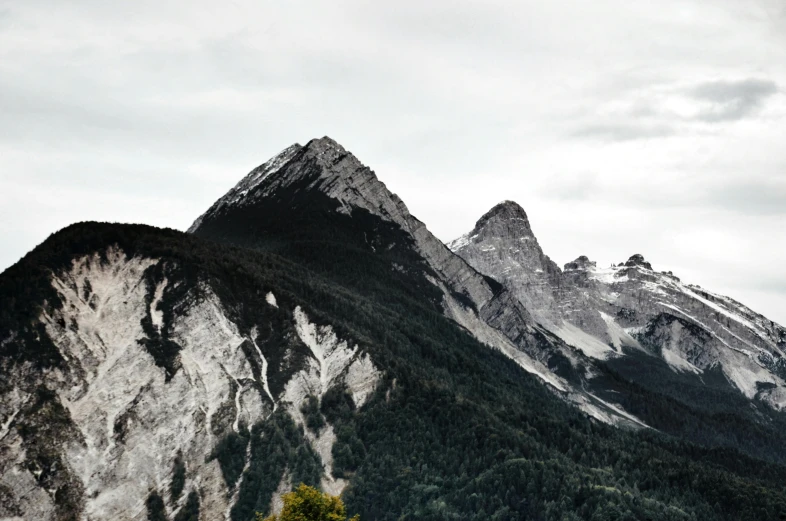 an area with a large mountain in the background