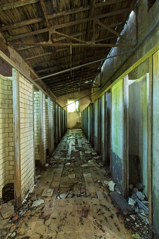 there is an empty warehouse with white brick walls