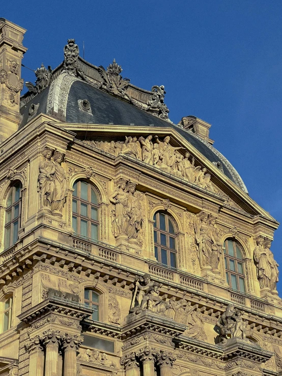 there is a clock on the top of a tall building