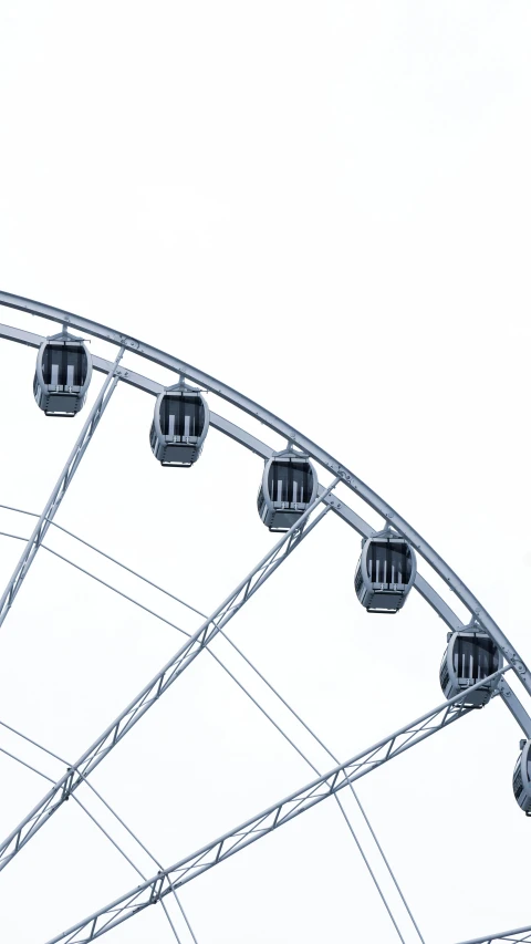 a carnival ferris wheel with a bunch of windows